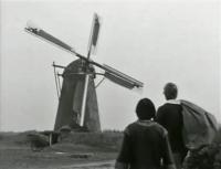 De Hernense molen met de Gelderse soldaten aan de wieken<BR>
 / Bron: Floris, NTS