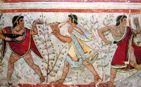 Etruskische voorstelling. Je ziet in het midden de <I>aulos</I>, rechts een <I>handlier</I>. / Bron: Onbekend, Wikimedia Commons (Publiek domein)